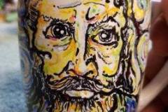 Roger-Millers-self-portrait-Enamel-on-white-cup-3-13-20